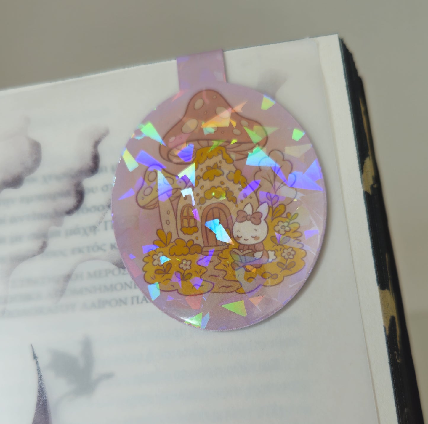 Holographic sticker with cartoon design on a white surface