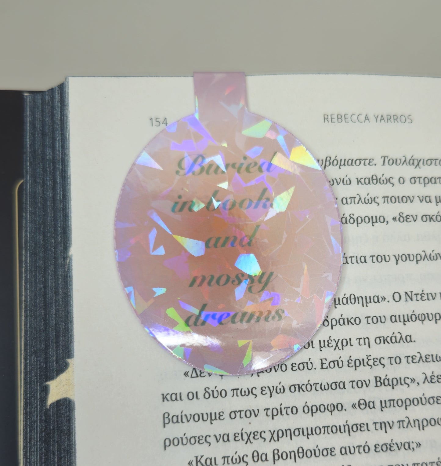 Holographic bookmark on an open book
