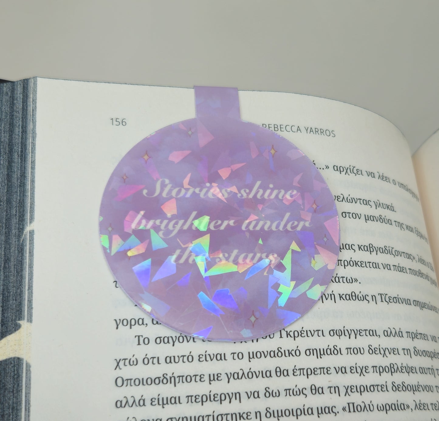 Holographic bookmark with text on an open book