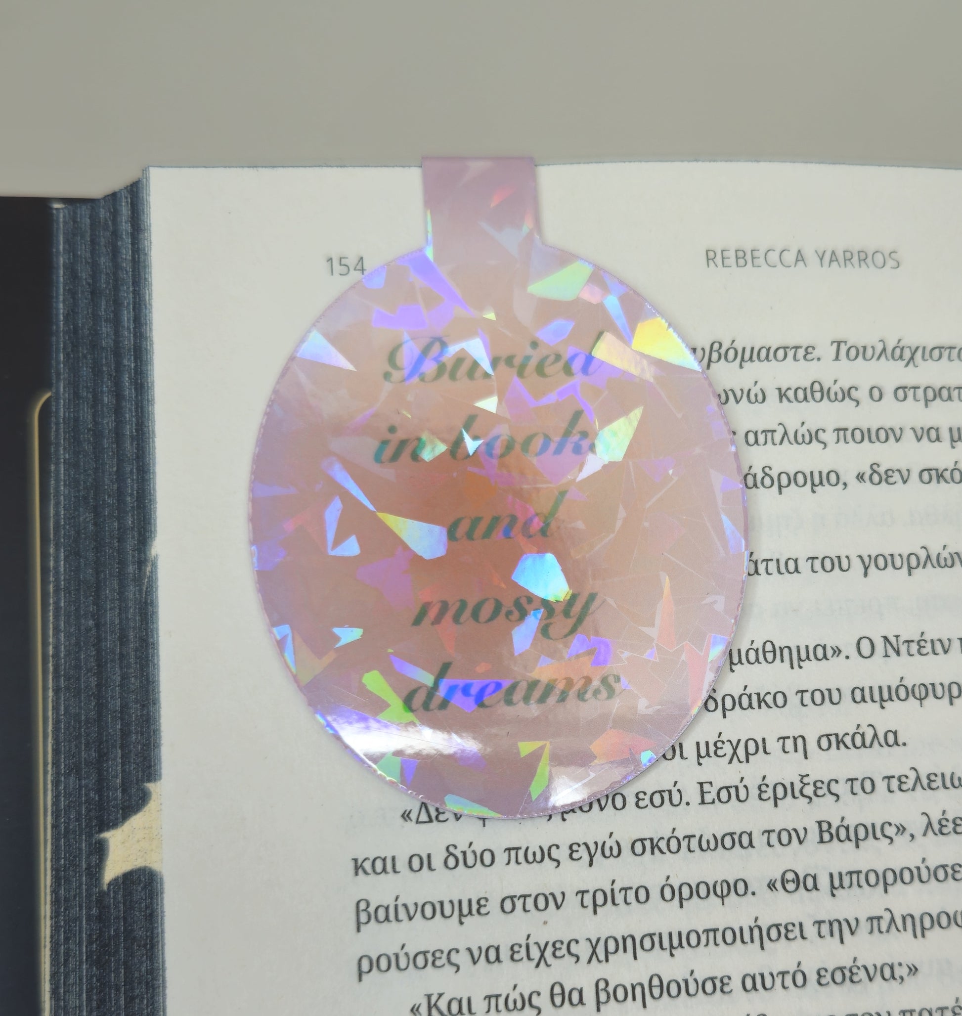 Holographic bookmark on an open book